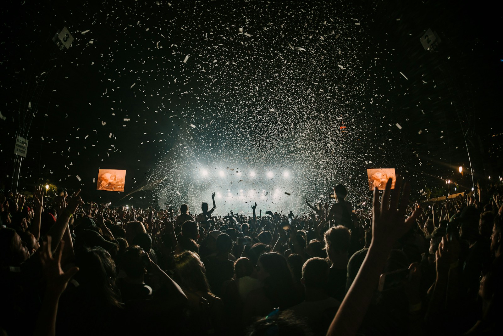 Dense crowd in front of a stage at an event—crowd management and security challenge in Montreal